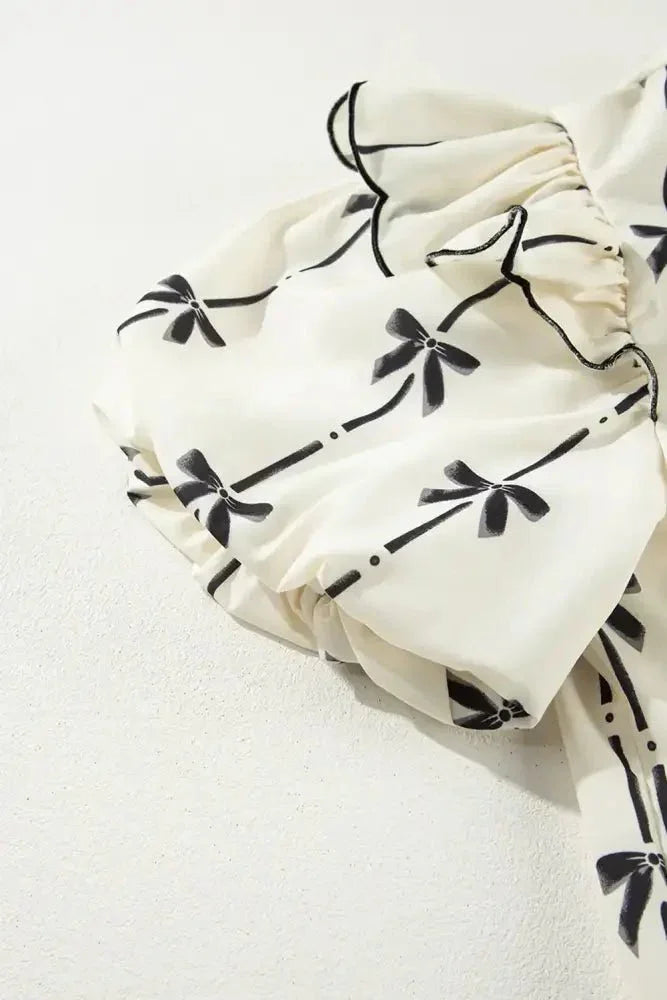 Bow Print Tie Neck Short Sleeve Blouse - Update AvenueVacation StyleTrendsi100100733236571100100733236571b329d719 - 1c01 - 491a - 9e24 - 85170f8cdd63 - MaxIvory