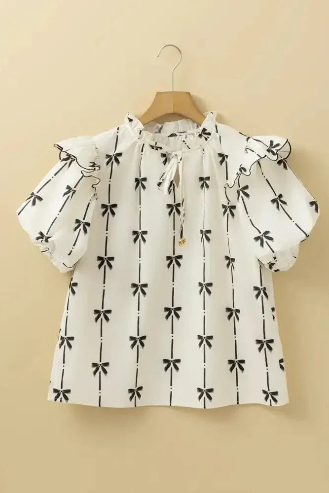 Bow Print Tie Neck Short Sleeve Blouse - Update AvenueVacation StyleTrendsi1001007332365711001007332365715b30a234 - bb70 - 4431 - 8d33 - b9fb311dfe0e - MaxIvory