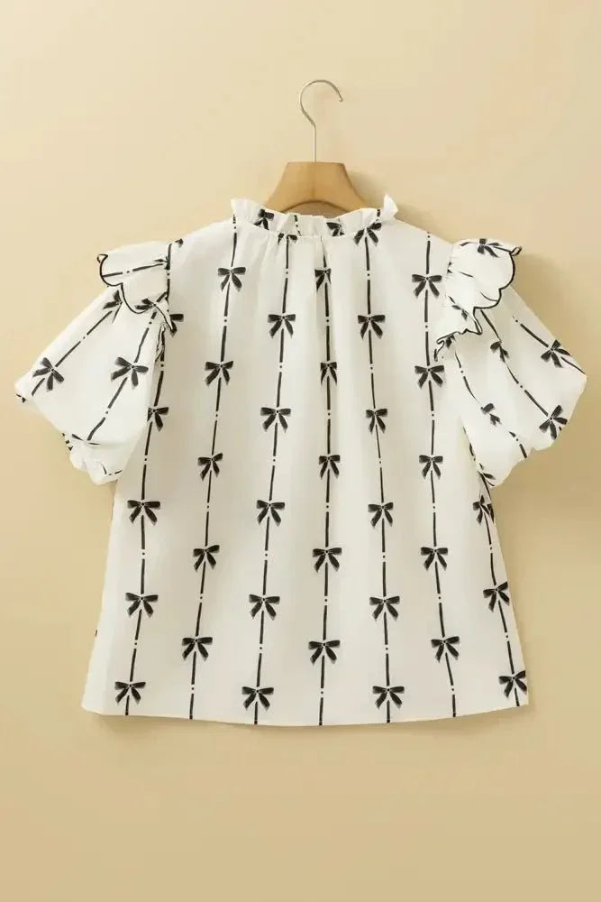 Bow Print Tie Neck Short Sleeve Blouse - Update AvenueVacation StyleTrendsi1001007332365711001007332365712ce23f45 - 30b6 - 4722 - 85eb - 46a43923ec25 - MaxIvory