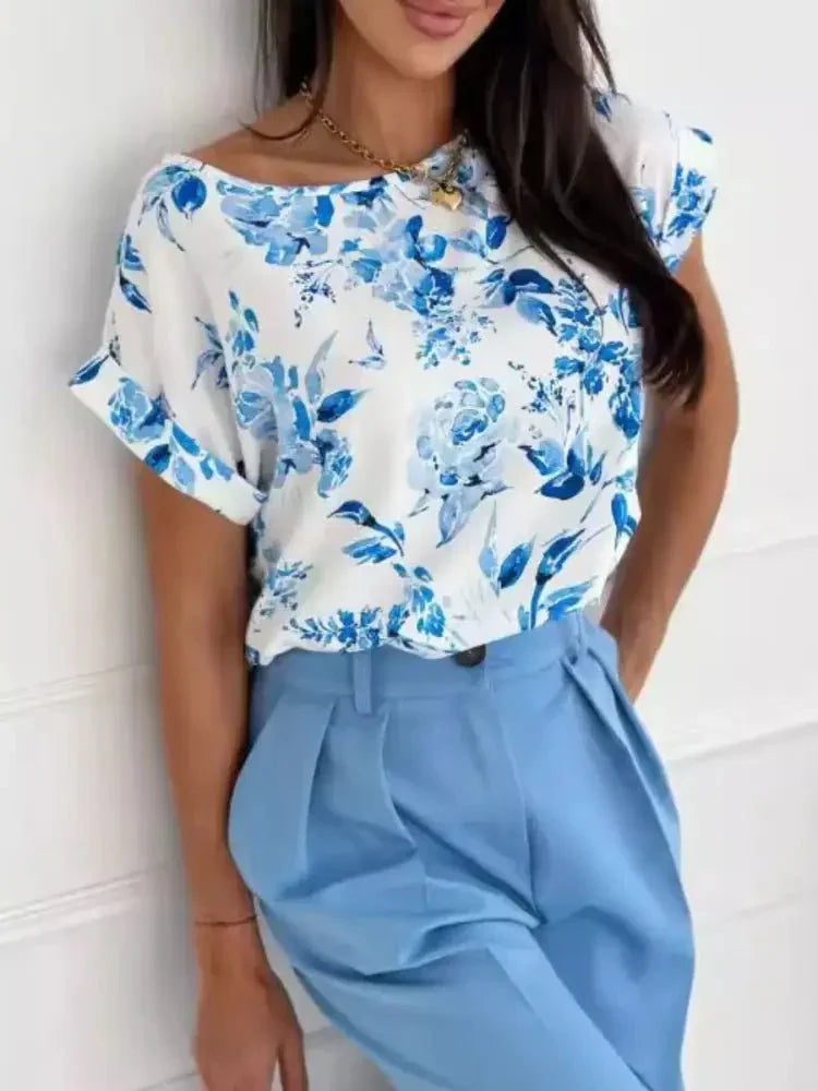 Classic Rolled Sleeve T-Shirt - Update AvenueT-ShirtsTrendsi1001009233805551001009233805552b702021 - 0eb2 - 4025 - 9cad - 13baf01ae2fb - Max - OriginBlue Background Pink Flower