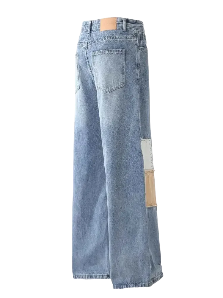 Light blue vintage patchwork wide leg jeans with contrasting fabric patches on the side