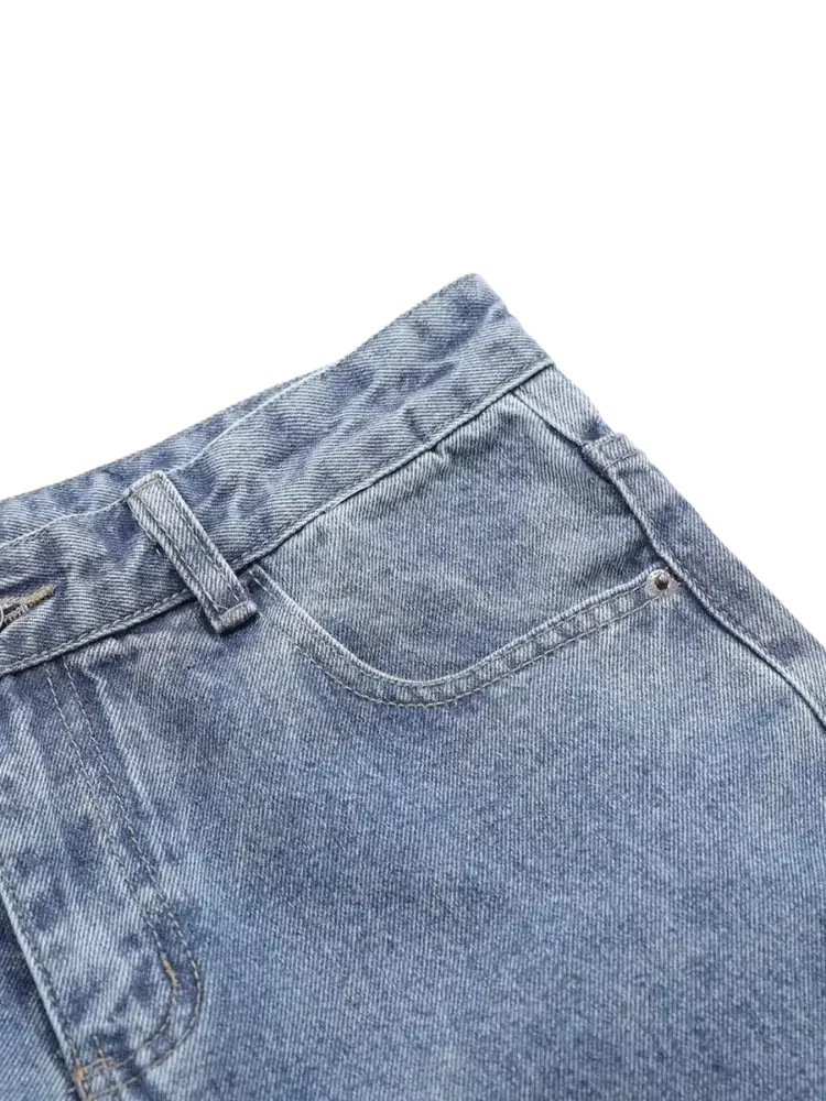 Vintage patchwork wide leg jeans featuring light wash denim, front pocket, and belt loops