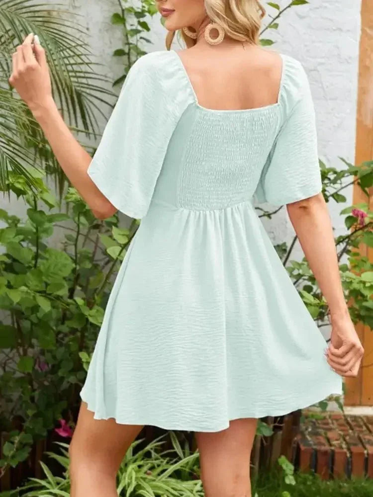 Smocked Back Knotted Flutter Sleeve Dress - Update AvenueEffortless Elegance: DressesTrendsi100100009893306100100009893306a3d36d94 - 7956 - 41ff - 8ff3 - 043e8fc7731f - Max - OriginLight Green