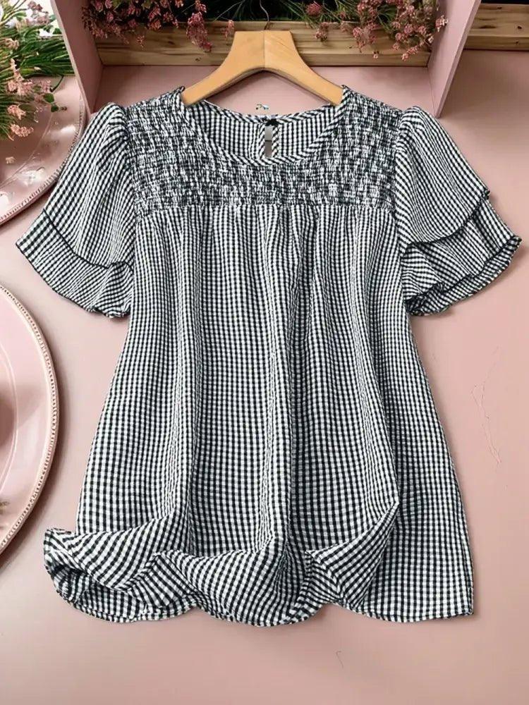 Smocked Plaid Round Neck Layered Short Sleeve Blouse - Update AvenueTrendsi100100454251867100100454251867beeb49d5 - 33fc - 4786 - aed4 - 78c537979d1c - MaxPlaid