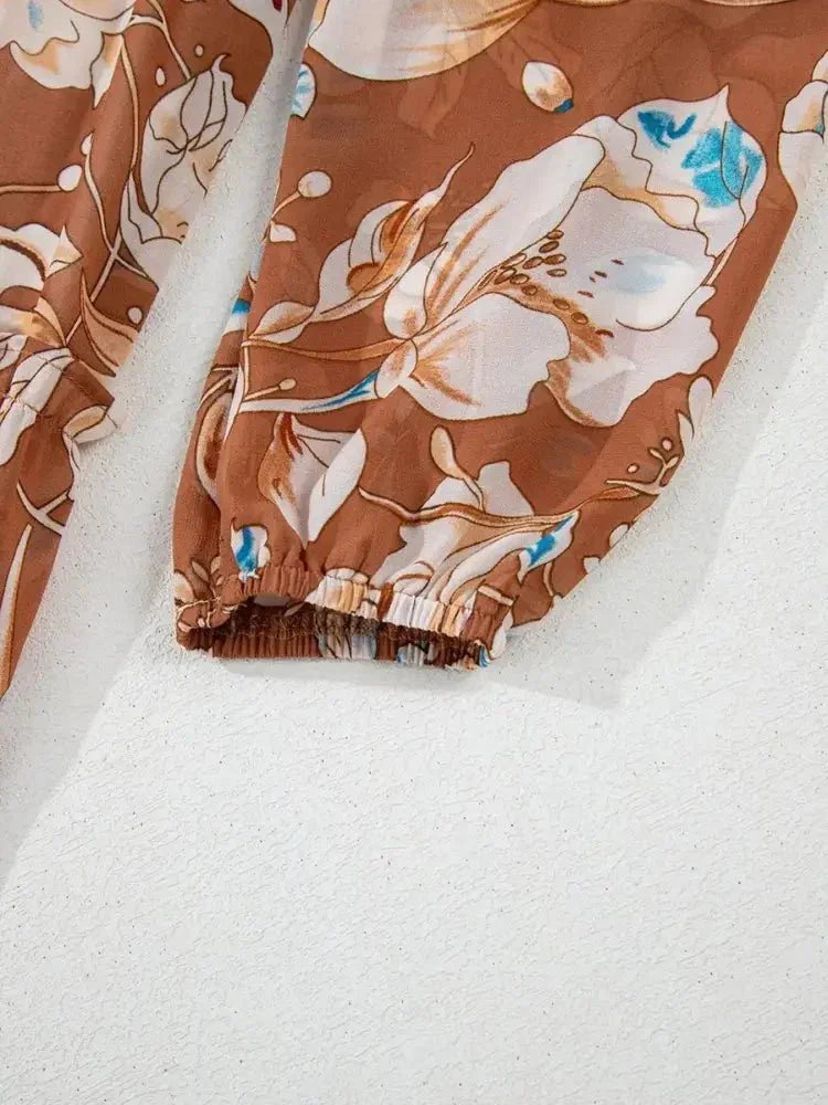 Smocked Printed Long Sleeve Tiered Dress - Update AvenueCasual DressesTrendsi100100420514817100100420514817Smocked Printed Long Sleeve Tiered DressFloral