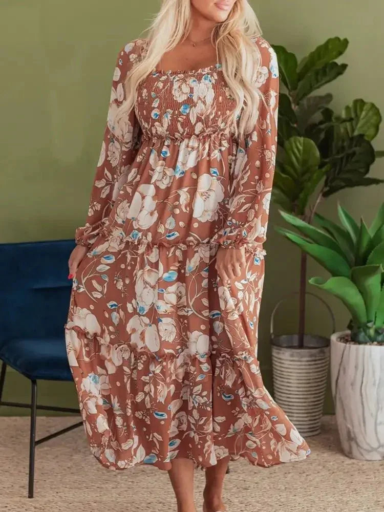 Smocked Printed Long Sleeve Tiered Dress - Update AvenueCasual DressesTrendsi100100420514817100100420514817Smocked Printed Long Sleeve Tiered DressFloral