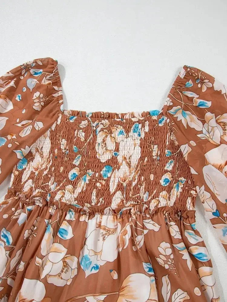 Smocked Printed Long Sleeve Tiered Dress - Update AvenueCasual DressesTrendsi100100420514817100100420514817Smocked Printed Long Sleeve Tiered DressFloral