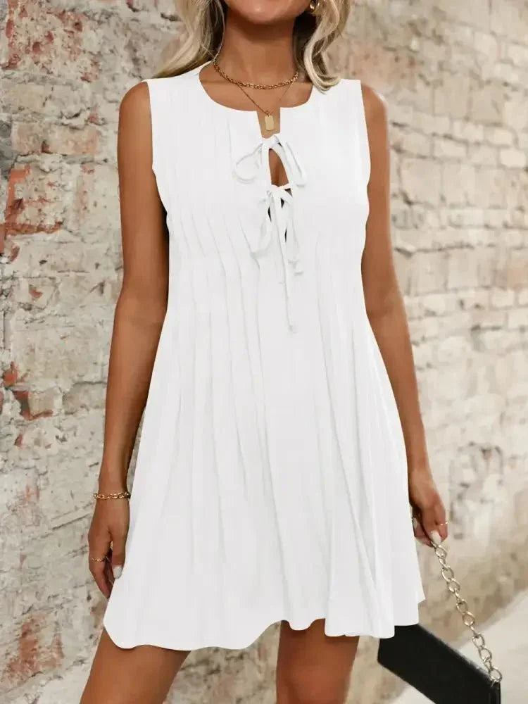 Tied Front Pleated Sleeveless Mini Dress - Update AvenueEffortless Elegance: DressesTrendsi100100737391724100100737391724e65f9436 - 36e8 - 4e3e - b594 - 2953cae4a537 - MaxWhite