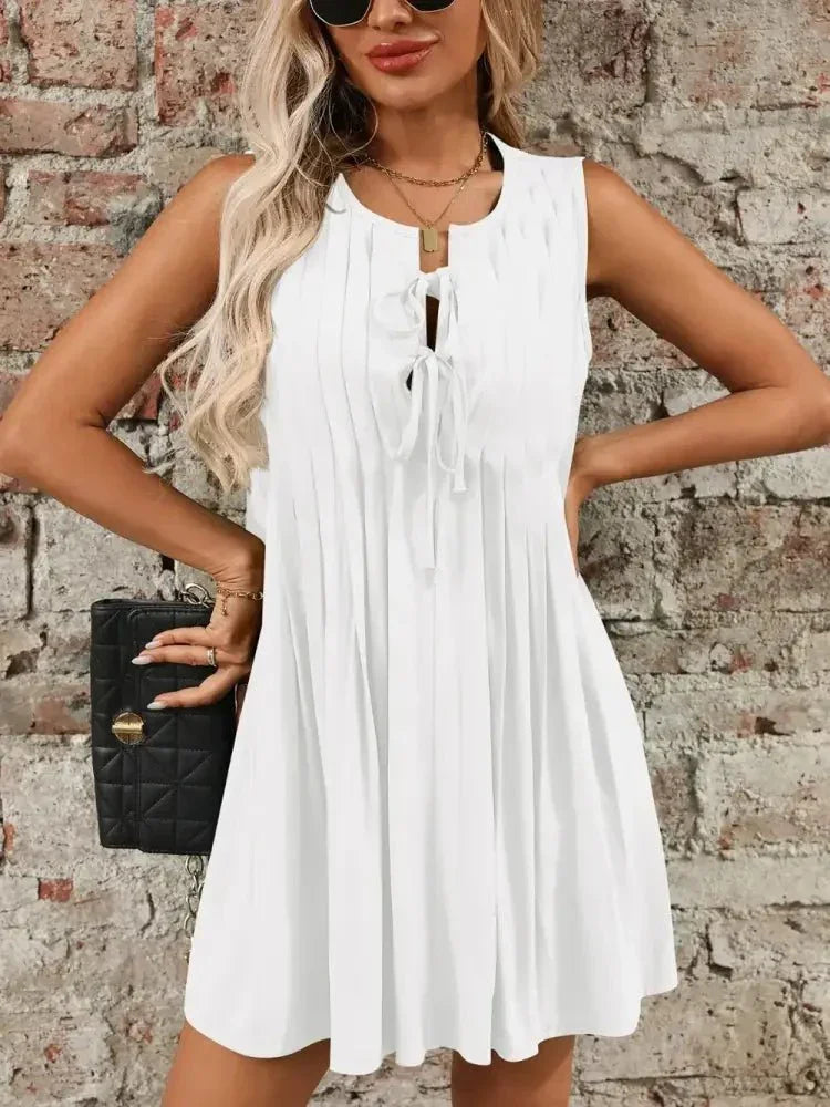 Tied Front Pleated Sleeveless Mini Dress - Update AvenueEffortless Elegance: DressesTrendsi100100737391724100100737391724bbbff7fd - 3828 - 4d98 - 8af5 - e4499b0dc0d9 - MaxWhite