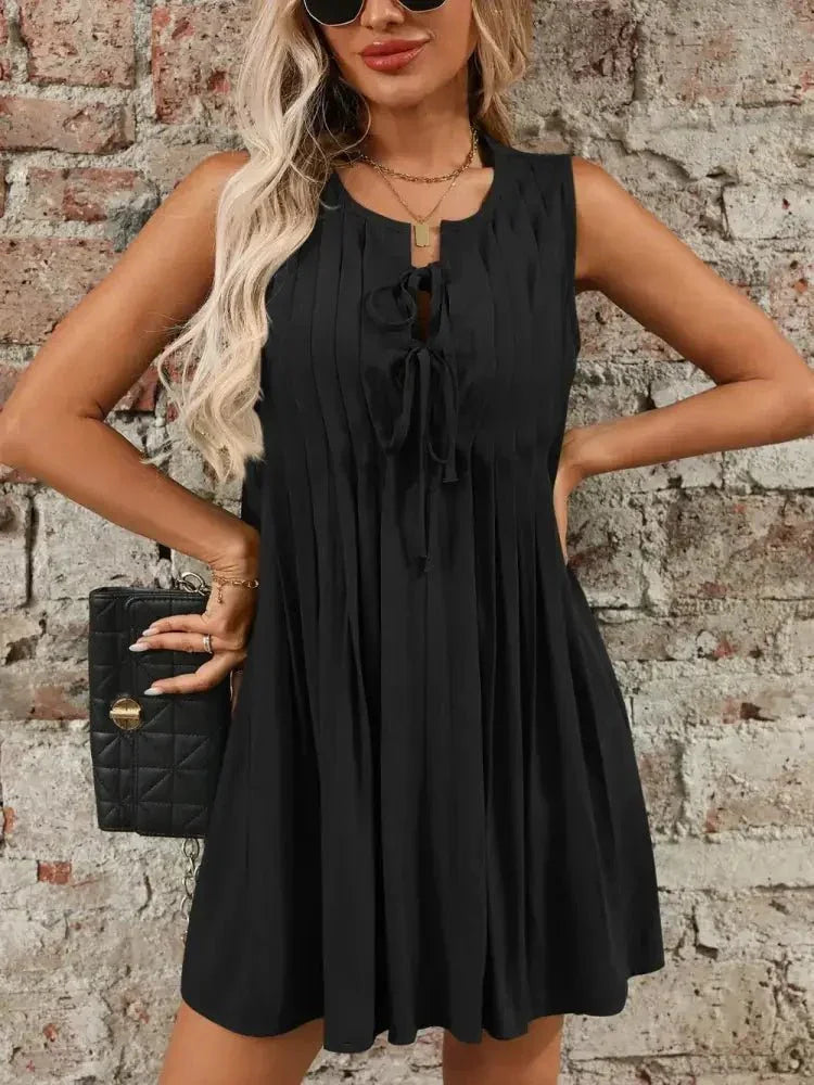 Tied Front Pleated Sleeveless Mini Dress - Update AvenueEffortless Elegance: DressesTrendsi1001007373995931001007373995932ef36f99 - b788 - 48b2 - beee - 7d16445ac97f - MaxBlack
