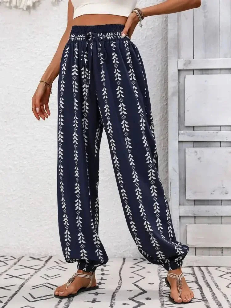 Tied Printed High Waist Pants - Update AvenueBoho VibesTrendsi100100994771982100100994771982cd1196cf - 9f55 - 485e - 8f4f - d8deabaaff61 - MaxDark Blue