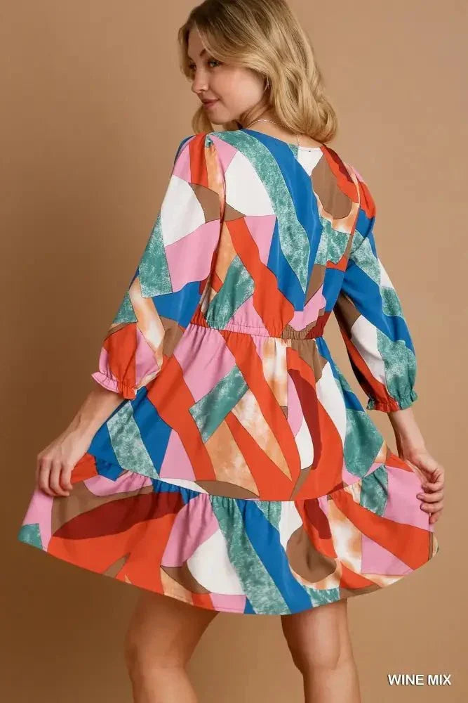 Umgee Abstract V - Neck Tiered Printed Dress - Update AvenueCasual DressesTrendsi100100697231144100100697231144Umgee Abstract V - Neck Tiered Printed DressWINE MIX