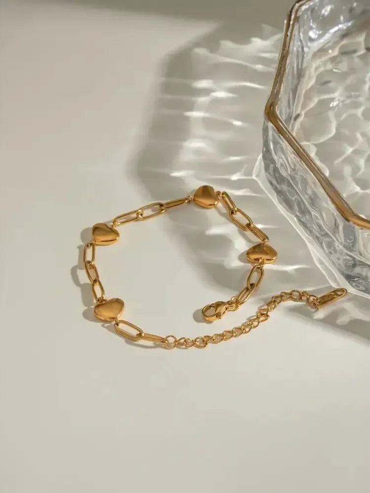 18K Gold - Plated Stainless Steel Heart Bracelet - Update AvenueBraceletsTrendsi10050007171126310050007171126318K Gold - Plated Stainless Steel Heart BraceletGold