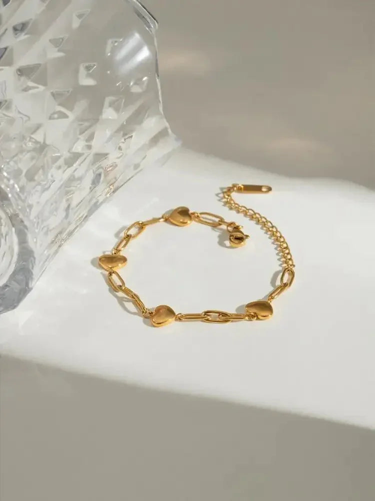 18K Gold - Plated Stainless Steel Heart Bracelet - Update AvenueBraceletsTrendsi10050007171126310050007171126318K Gold - Plated Stainless Steel Heart BraceletGold