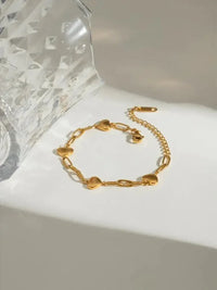 18K Gold - Plated Stainless Steel Heart Bracelet - Update AvenueBraceletsTrendsi10050007171126310050007171126318K Gold - Plated Stainless Steel Heart BraceletGold