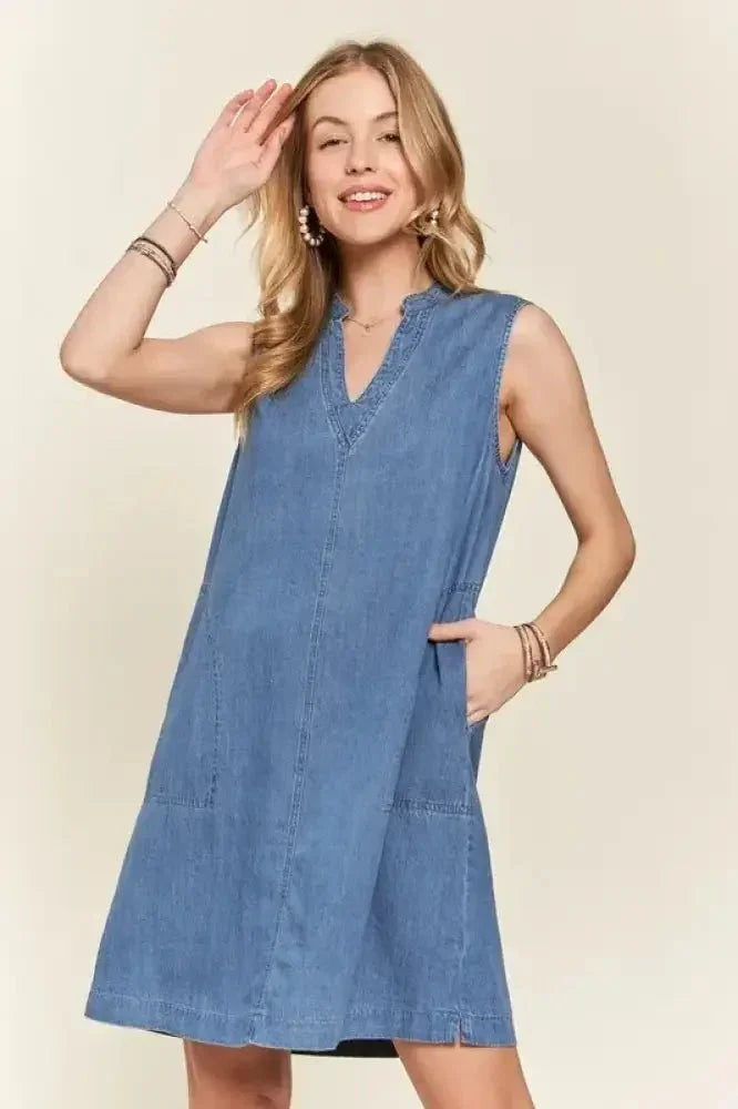 ADORA Notched Sleeveless Denim Dress with Pockets - Update AvenueDenim Dresses & SkirtsTrendsi10010065502152010010065502152041145248 - 82a1 - 4c60 - bb94 - 4bdec4f60520 - MaxMedium