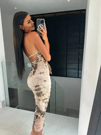 Backless Printed Halter Neck Dress - Update AvenueFestival VibesTrendsi100100415949998100100415949998b338e4fd - 5d86 - 4d67 - b36f - 60a5427a694e - MaxTan
