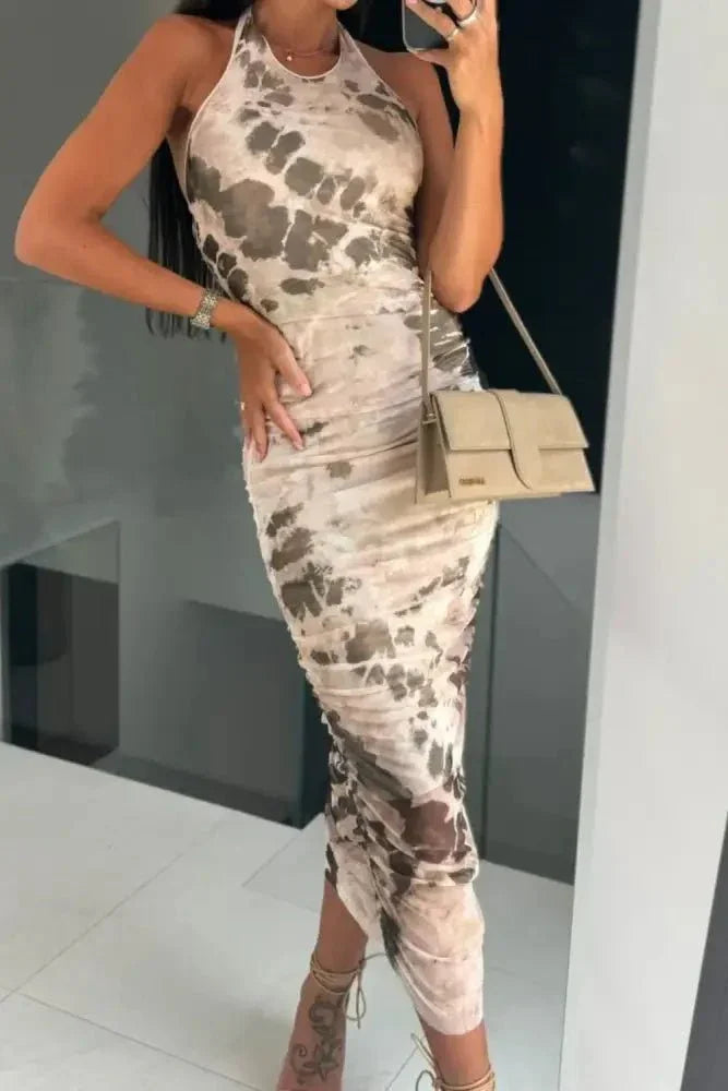Backless Printed Halter Neck Dress - Update AvenueFestival VibesTrendsi1001004159499981001004159499983ca600c8 - 6de6 - 4634 - be6d - f90dd5284caa - MaxTan