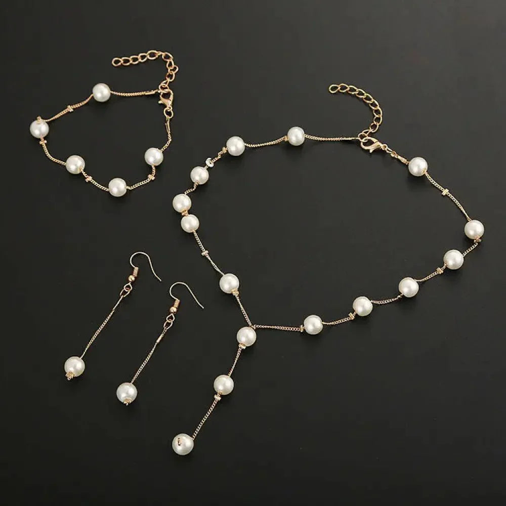 Boutique Korean version fashion sweet OL elegant pearl simple temperament necklace earrings bracelet set - Update AvenueUpdate Avenues212097056340001Boutique Korean version fashion sweet OL elegant pearl simple temperament necklace earrings bracelet set - Update AvenuesGold