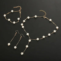 Boutique Korean version fashion sweet OL elegant pearl simple temperament necklace earrings bracelet set - Update AvenueUpdate Avenues212097056340001Boutique Korean version fashion sweet OL elegant pearl simple temperament necklace earrings bracelet set - Update AvenuesGold