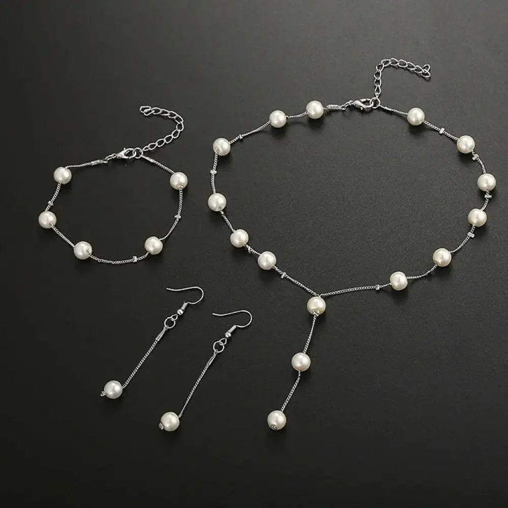 Boutique Korean version fashion sweet OL elegant pearl simple temperament necklace earrings bracelet set - Update AvenueUpdate Avenues212097056340001Boutique Korean version fashion sweet OL elegant pearl simple temperament necklace earrings bracelet set - Update AvenuesGold