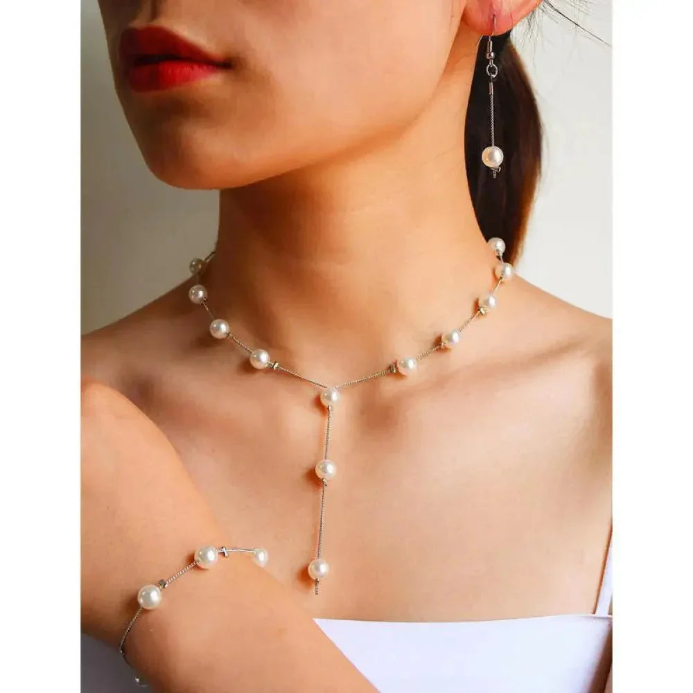 Boutique Korean version fashion sweet OL elegant pearl simple temperament necklace earrings bracelet set - Update AvenueUpdate Avenues212097056340001Boutique Korean version fashion sweet OL elegant pearl simple temperament necklace earrings bracelet set - Update AvenuesGold