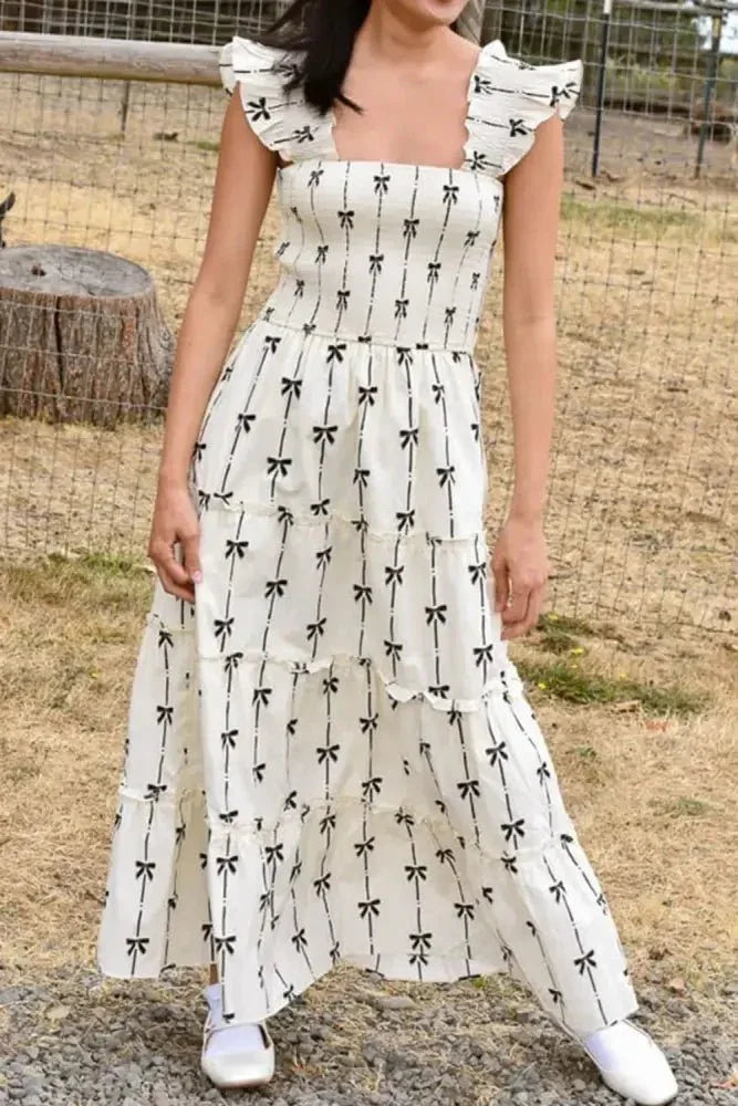 Bow Print Smocked Square Neck Ruffle Tiered Maxi Dress - Update AvenueFestival VibesTrendsi1001000020189601001000020189604b99378a - d2e1 - 4b7d - 94e9 - ba2735d3e9ed - MaxWhite