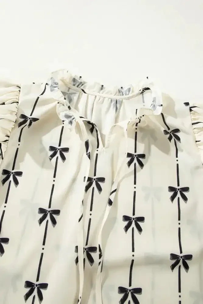 Bow Print Tie Neck Short Sleeve Blouse - Update AvenueVacation StyleTrendsi100100733236571100100733236571c9a32de8 - be82 - 4625 - bc7a - 8168562e8885 - MaxIvory