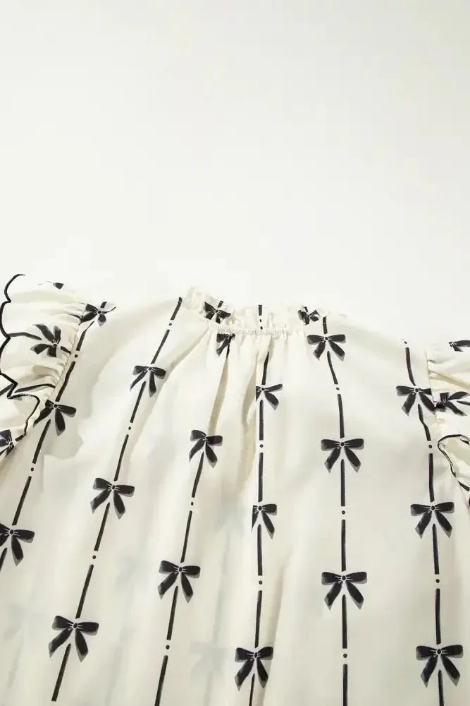 Bow Print Tie Neck Short Sleeve Blouse - Update AvenueVacation StyleTrendsi100100733236571100100733236571f6e15595 - e2d3 - 47d8 - af14 - cdf8a3f14d15 - MaxIvory