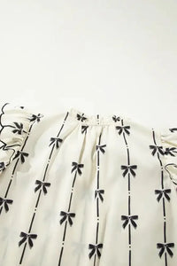 Bow Print Tie Neck Short Sleeve Blouse - Update AvenueVacation StyleTrendsi100100733236571100100733236571f6e15595 - e2d3 - 47d8 - af14 - cdf8a3f14d15 - MaxIvory