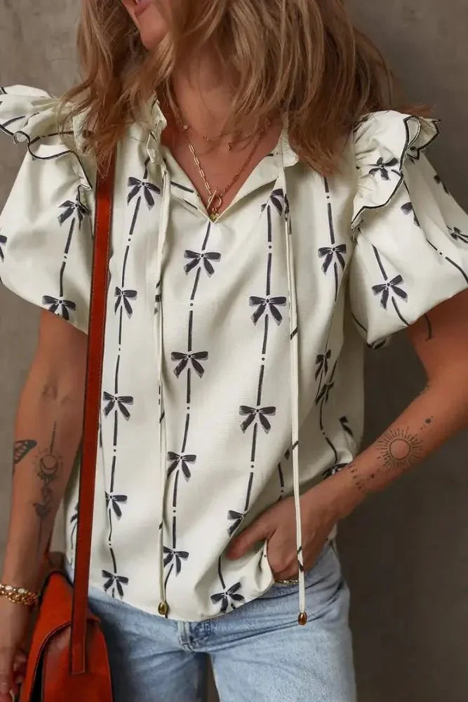 Bow Print Tie Neck Short Sleeve Blouse - Update AvenueVacation StyleTrendsi10010073323657110010073323657115cd9234 - 6d14 - 413b - 94f5 - 71cbe29aff2f - MaxIvory