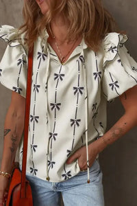 Bow Print Tie Neck Short Sleeve Blouse - Update AvenueVacation StyleTrendsi10010073323657110010073323657115cd9234 - 6d14 - 413b - 94f5 - 71cbe29aff2f - MaxIvory