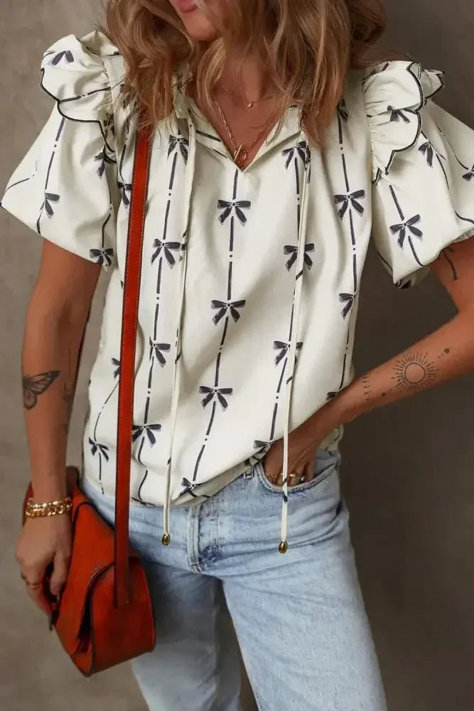 Bow Print Tie Neck Short Sleeve Blouse - Update AvenueVacation StyleTrendsi100100733236571100100733236571d9ed531f - 38ec - 4c64 - 9307 - c57506992835 - MaxIvory