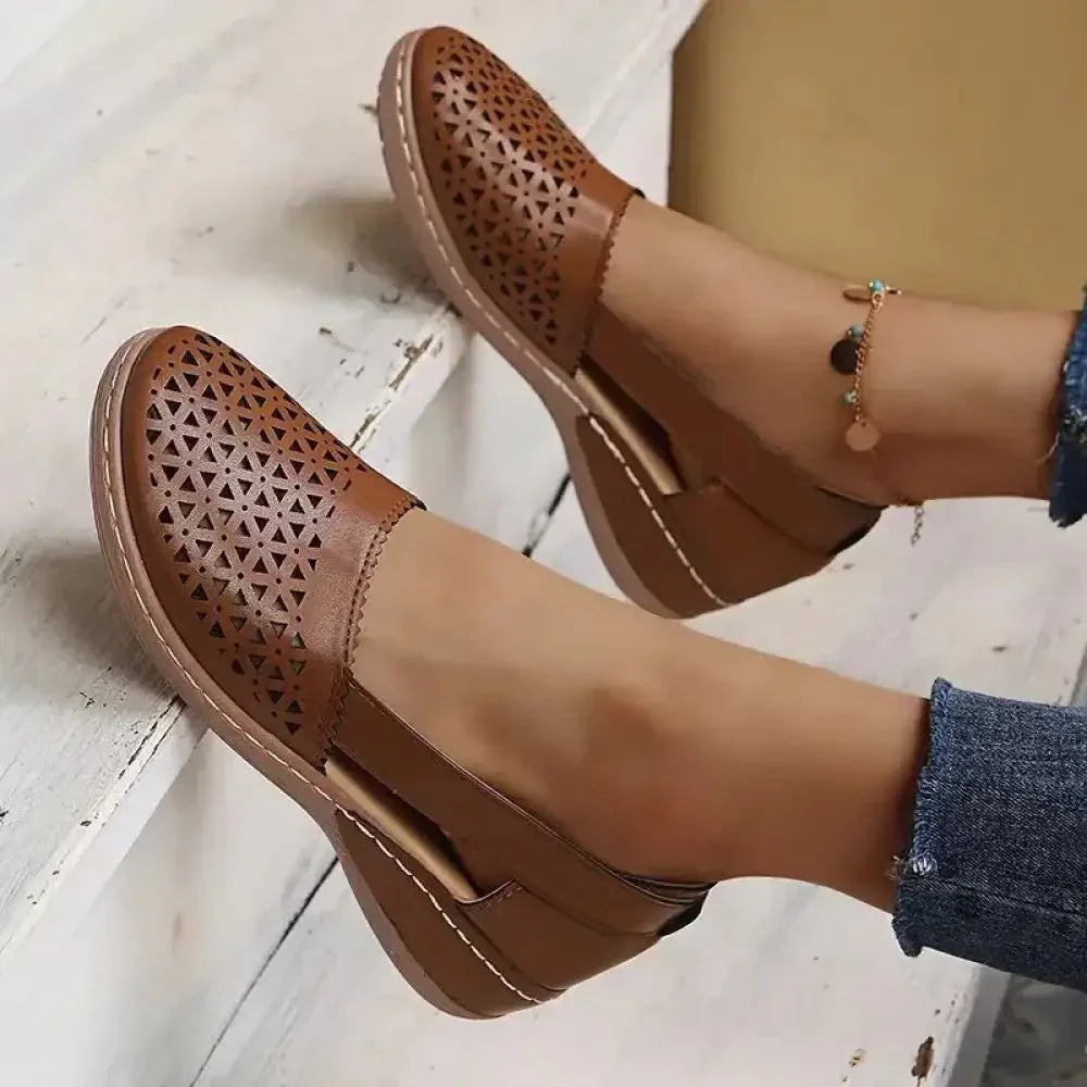 Cutout Round Toe Slip - Ons - Update AvenueTrendsi100600666782468100600666782468Cutout Round Toe Slip - OnsBrown
