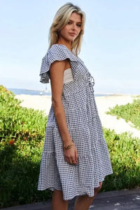 Davi & Dani Jacquard V - Neck Flutter Cap Sleeve Tiered Dress - Update AvenueEffortless Elegance: DressesTrendsi100100373431766100100373431766725ca5cd6433474c86fcef1d58ae1cdd - Max - OriginBlack Ivory