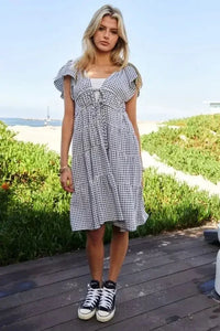 Davi & Dani Jacquard V - Neck Flutter Cap Sleeve Tiered Dress - Update AvenueEffortless Elegance: DressesTrendsi100100373431766100100373431766f68ce2aef6ab42e192cd5b4322380d79 - Max - OriginBlack Ivory