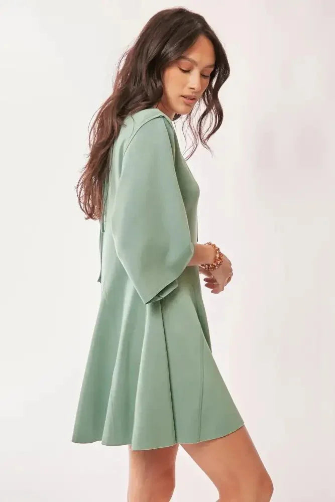 Davi & Dani Solid Draped Sleeve Ties Back Skort Romper - Update AvenueDaily EssentialsTrendsi100100839501753100100839501753160735b40e20436c877882504915dc70 - Max - OriginSEAFOAM GREEN