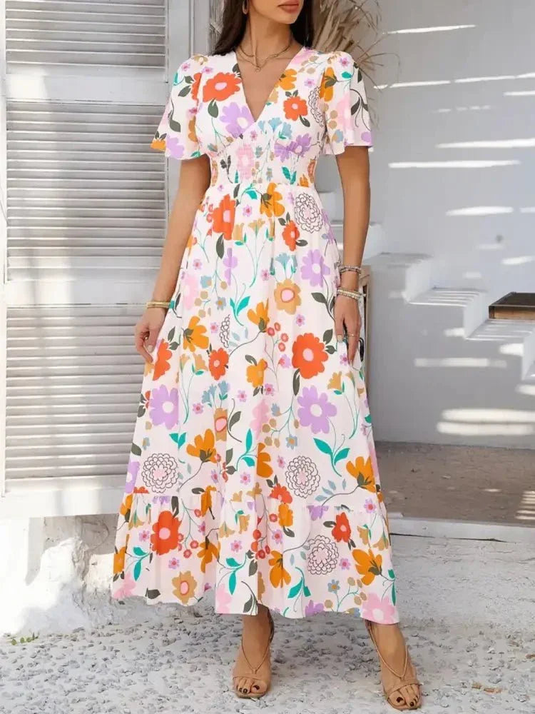 Devine Smocked Printed V - Neck Short Sleeve Maxi Dress - Update AvenueVacation StyleTrendsi10010012928132710010012928132711fd49aa - 0a70 - 4195 - 8d0e - 69c17382ad58 - MaxBlush Pink