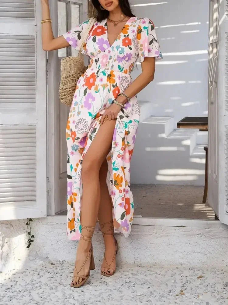 Devine Smocked Printed V - Neck Short Sleeve Maxi Dress - Update AvenueVacation StyleTrendsi1001001292813271001001292813272accf9d3 - ea1e - 4efd - 9581 - 612c5db1e152 - MaxBlush Pink