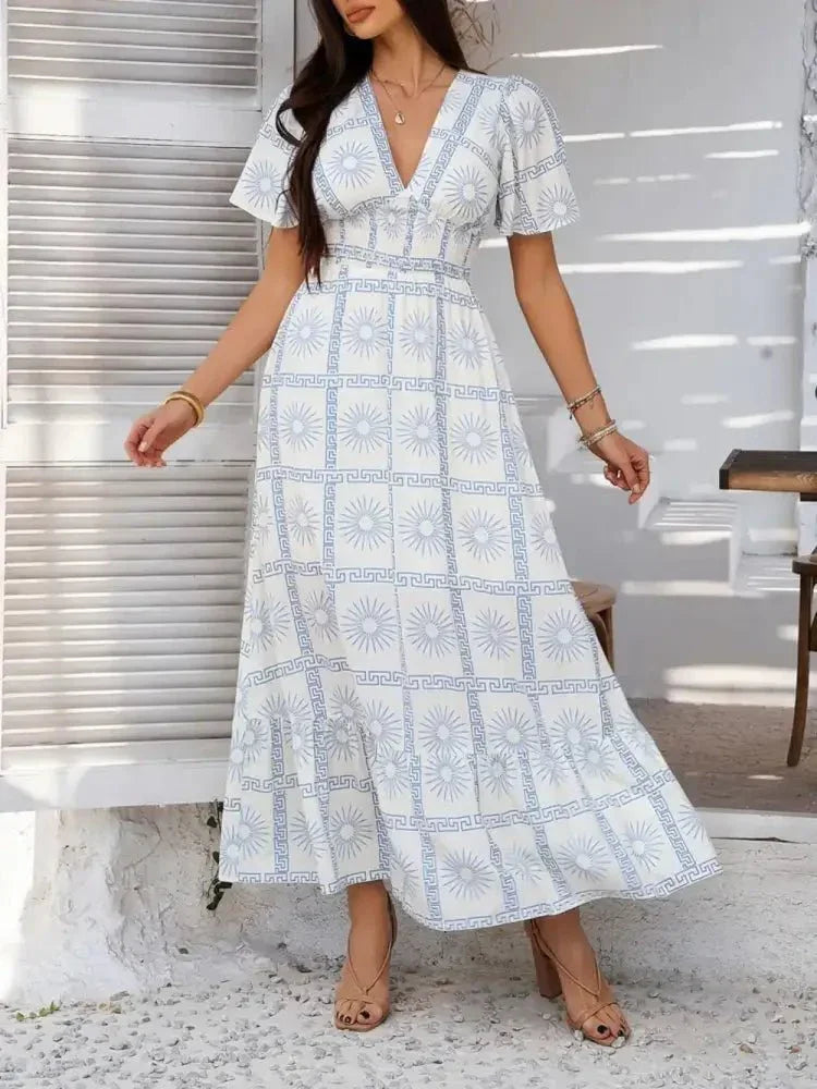 Devine Smocked Printed V - Neck Short Sleeve Maxi Dress - Update AvenueVacation StyleTrendsi1001001292818141001001292818149e801275 - a007 - 4d9b - ad31 - 4c1bb9c45578 - MaxLight Blue