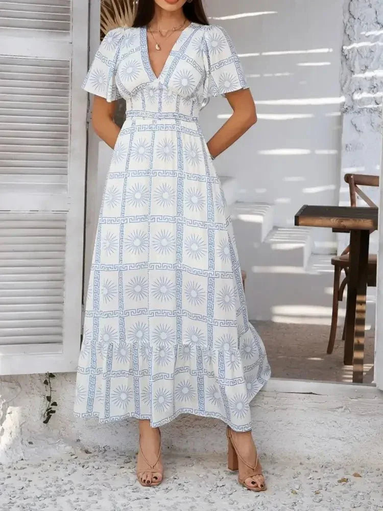 Devine Smocked Printed V - Neck Short Sleeve Maxi Dress - Update AvenueVacation StyleTrendsi100100129281814100100129281814ce13fdd5 - 0184 - 4a5f - 90d0 - 832f1a4b471f - MaxLight Blue