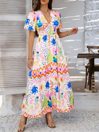 Devine Smocked Printed V - Neck Short Sleeve Maxi Dress - Update AvenueVacation StyleTrendsi100100129285905100100129285905f4104b35 - f3a9 - 4acf - a439 - 7d061502ca15 - MaxMulticolor