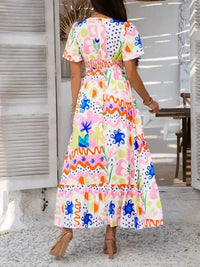 Devine Smocked Printed V - Neck Short Sleeve Maxi Dress - Update AvenueVacation StyleTrendsi1001001292859051001001292859052d003188 - 8092 - 4645 - 97ef - 30245bdfe74e - MaxMulticolor