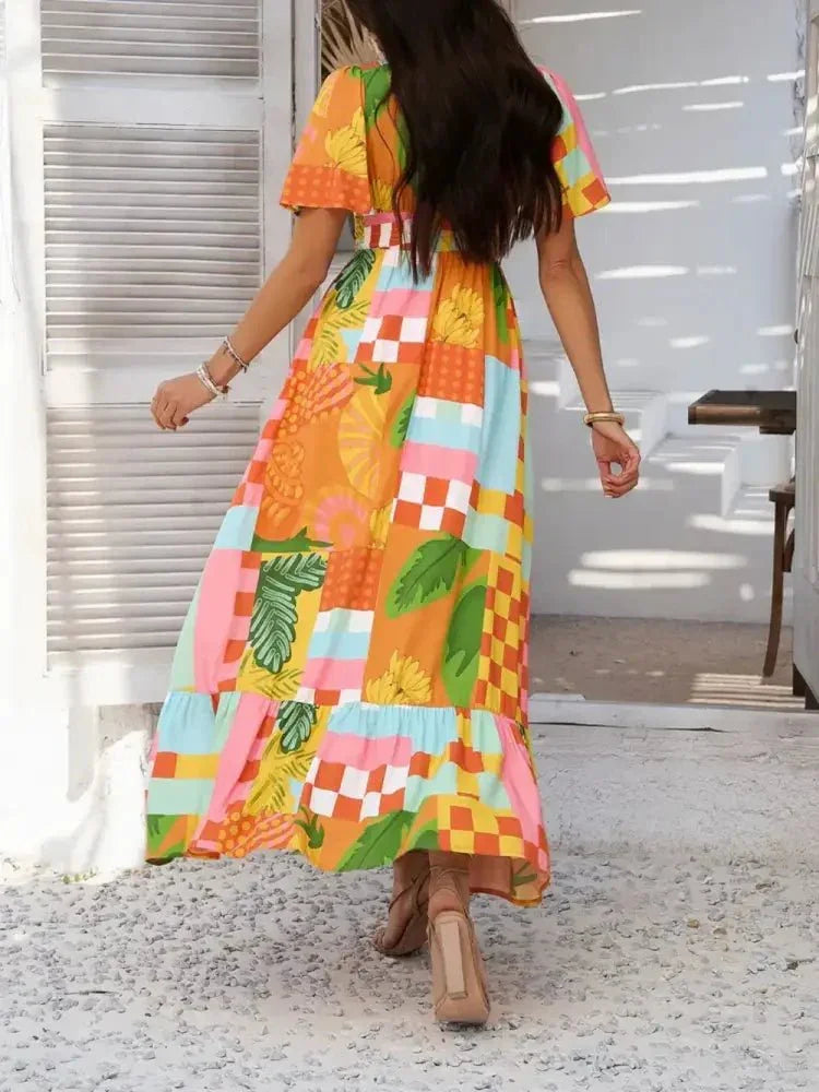 Devine Smocked Printed V - Neck Short Sleeve Maxi Dress - Update AvenueVacation StyleTrendsi100100129289426100100129289426d134f864 - 5234 - 4742 - 9998 - 66a0aa8fa21f - MaxTangerine