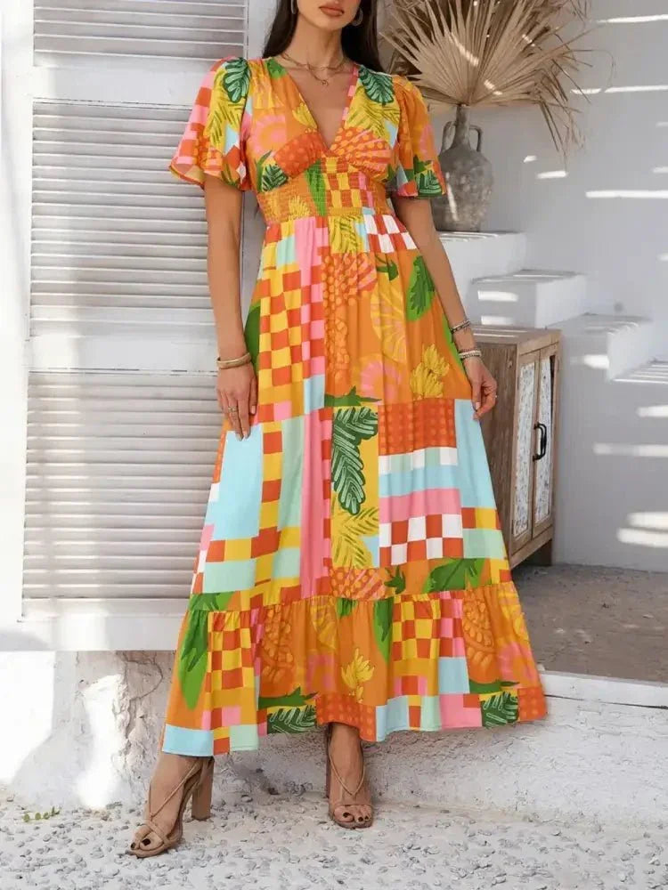 Devine Smocked Printed V - Neck Short Sleeve Maxi Dress - Update AvenueVacation StyleTrendsi100100129289426100100129289426e219e744 - 046b - 4950 - 802b - e2e15aef6399 - MaxTangerine