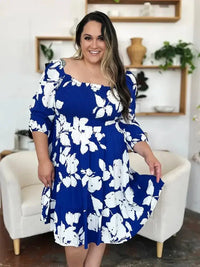 Double Take Full Size Floral Ruffle Hem Smocked Dress with Pockets - Update AvenueVacation StyleTrendsi100100451787879100100451787879d06e1e16 - c827 - 4f65 - ab9f - b5d59dcf25e9 - MaxRoyal Blue
