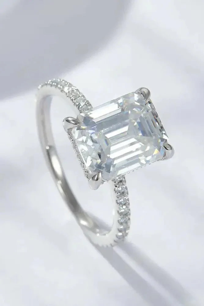 Emerald Cut 4 Carat Moissanite Side Stone Ring - Update AvenueRingTrendsi101300023549010101300023549010Emerald Cut 4 Carat Moissanite Side Stone RingSilver