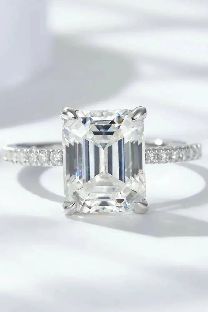 Emerald Cut 4 Carat Moissanite Side Stone Ring - Update AvenueRingTrendsi101300023549010101300023549010Emerald Cut 4 Carat Moissanite Side Stone RingSilver