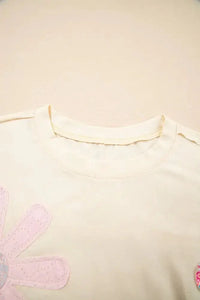 Flower Patched Exposed Stitching Trim Crew Neck Loose Tee - Update AvenueT-ShirtsTrendsi10010025099632310010025099632319aec1af - aea3 - 4cae - bbce - d7ea4270eeef - Max - OriginCream