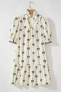 Frill Bow Print Notched Short Sleeve Mini Dress - Update AvenueVacation StyleTrendsi1001008969818081001008969818089934eee1 - 2324 - 404f - aca3 - 4cab68e8ac5b - MaxCream